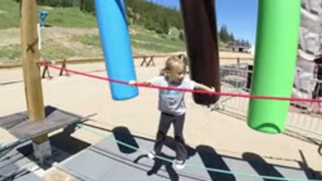 WINTER PARK COLORADO-2019: Kindergartener Moves On Obstacle Course While Holding
