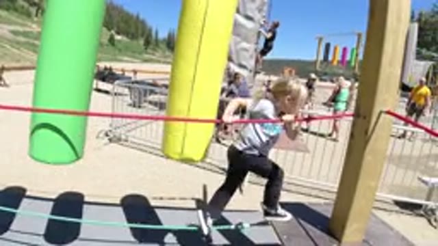 WINTER PARK COLORADO-2019: A Kid Is Having Fun Playing On A Structure