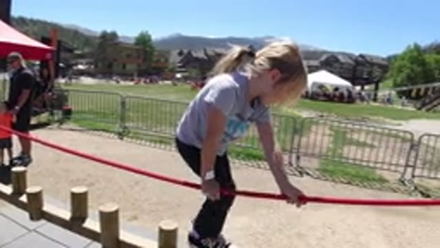 WINTER PARK COLORADO-2019: Pretty Little Girl Walking Carefully on Wood Pegs