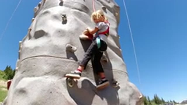 WINTER PARK COLORADO-2019: Girl Is Connected To Wires And Rock Climbing Then She