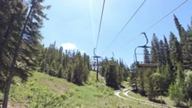 WINTER PARK COLORADO-2019: Electric Lift Through Forest Woods Cable Seat