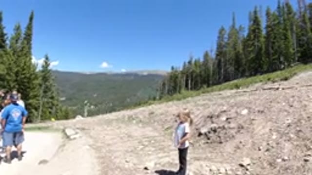 WINTER PARK COLORADO-2019: Large Forest Area Off In The Distance With A Gravel Path