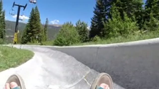 WINTER PARK COLORADO-2019: Little Girl Takes The Long Slide Down