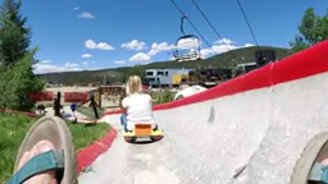 WINTER PARK COLORADO-2019: Women Riding Boxcar Ride Very Slowly At A Local State Fair
