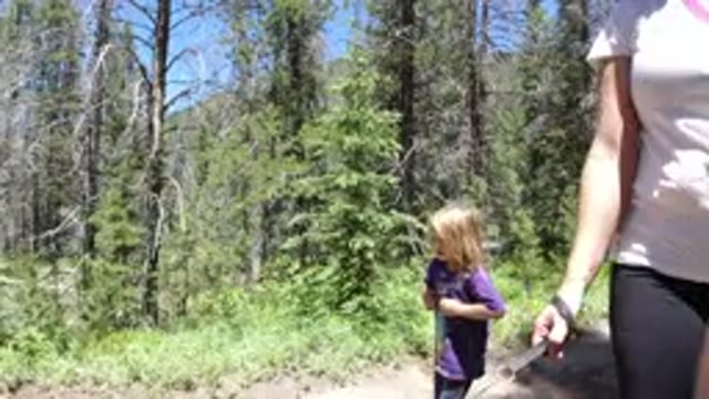 WINTER PARK COLORADO-2019: Mother And Daughter Trekking Together In The Woods