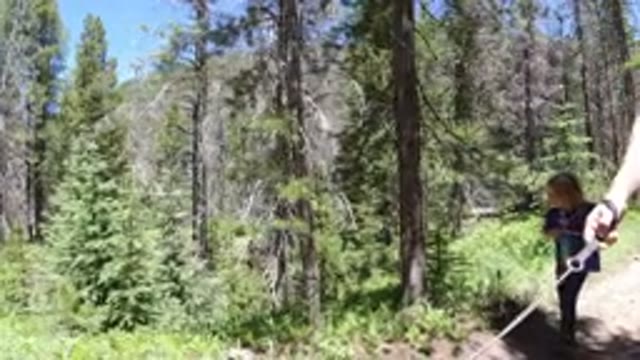 WINTER PARK COLORADO-2019: Mother And Daughter Hiking Outdoor On Forest Trails