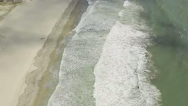 LOS CABOS MEXICO-2019: Waves Pouring Onto The Sandy Shores One Right After The