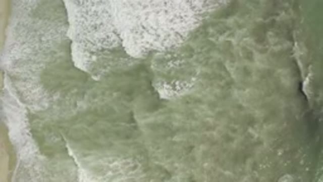 LOS CABOS MEXICO-2019: Straight Top View Of Small Waves And White-Bubbles In A