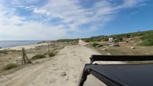 LOS CABOS MEXICO-2019: Off-Road Jeep Drive Along A Dirt Road By The Coast