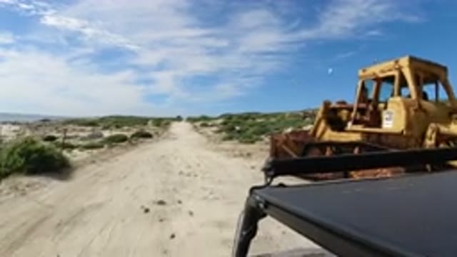 LOS CABOS MEXICO-2019: Driving On Sandy Desert Road Next To The Ocean