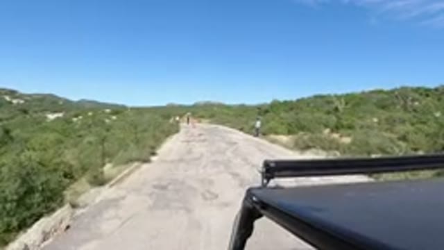 LOS CABOS MEXICO-2019: Car Trail Leads To Breathtaking Views Of Mountain Range