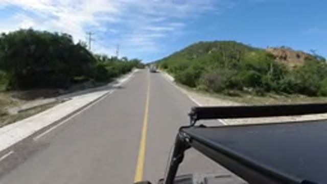 LOS CABOS MEXICO-2019: Fast Moving Jeep Or Truck On A Straight Highway And