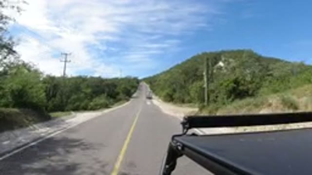 LOS CABOS MEXICO-2019: Travelling On The Road In A Car With Mountain View On