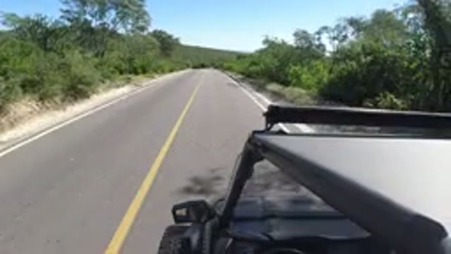 LOS CABOS MEXICO-2019: A Fast Moving Safari Vehicle On A Highway Which Is In The