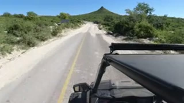 LOS CABOS MEXICO-2019: Jeep Driving Through Highway Full Of Sand But With Lots
