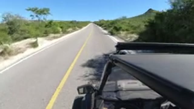 LOS CABOS MEXICO-2019: A Vehicle Is Running Fast On A Straight Clean Road