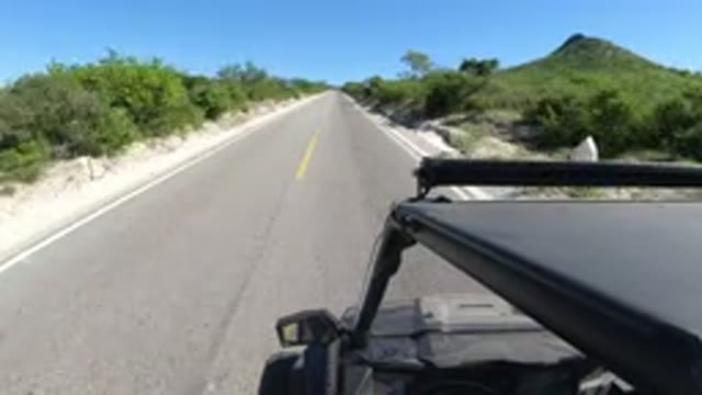 LOS CABOS MEXICO-2019: A Fast Moving And Clean Straight Line Road View From A