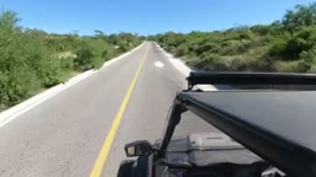 LOS CABOS MEXICO-2019: A Fast Moving Vehicle On A Two Way Track Road Constructed