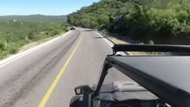 LOS CABOS MEXICO-2019: A Vehicle Moving On A Two Way Track Road In The Middle Of
