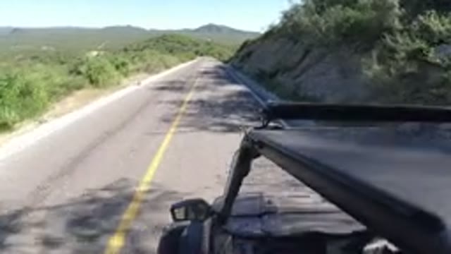 LOS CABOS MEXICO-2019: Smooth Driving On A Narrow Road On A Sunny Day