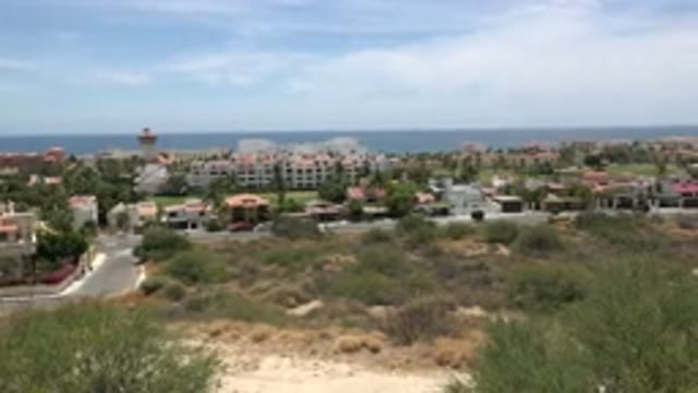 LOS CABOS MEXICO-2020: View Of Greenery Around Sand With Buildings And Beach In