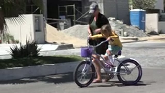 LOS CABOS MEXICO-2020: Mom Daughter Learning Wheels Bike Basket Caring