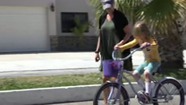 LOS CABOS MEXICO-2020: Mom Teaching Her Kid To Ride A Bike