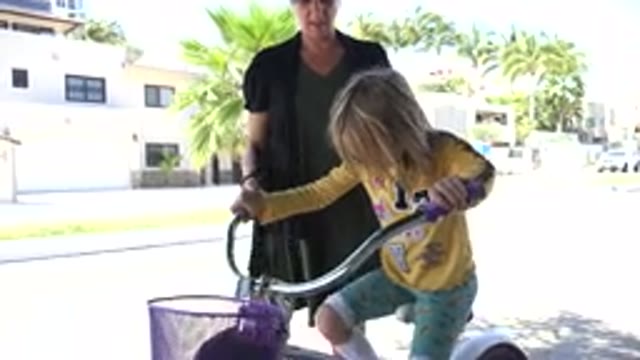 LOS CABOS MEXICO-2020: Parent Teaching Their Little Kid How To Ride A Bike