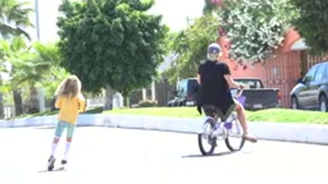 LOS CABOS MEXICO-2020: Mom Showing Daughter How To Ride A Bike