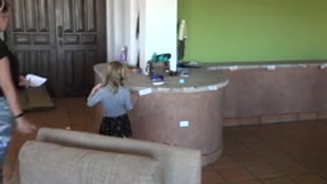LOS CABOS MEXICO-2020: Blonde Little Girl On A Treasure Hunt With Mom Watching