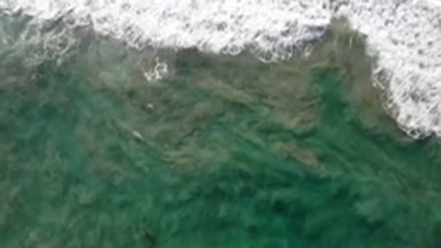 LOS CABOS MEXICO-2020: Waves Breaking At The Coastline As They Meet The Sand