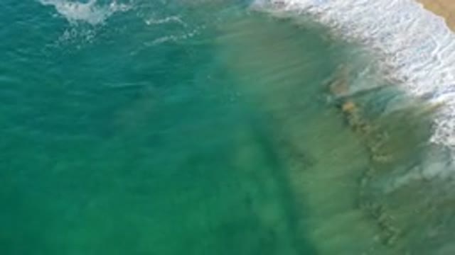 LOS CABOS MEXICO-2020: Still Turquoise Water with White Waves and Deep Calm