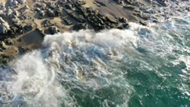 LOS CABOS MEXICO-2020: Green Sea With Waves On A Clear Day