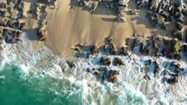 LOS CABOS MEXICO-2020: The Beautiful Green Warm Ocean Water Is Crashing Against