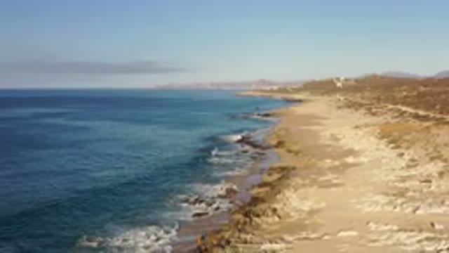 LOS CABOS MEXICO-2020: Rocky Shoreline Sandy Beach Recreation Tire-Tracks Dry