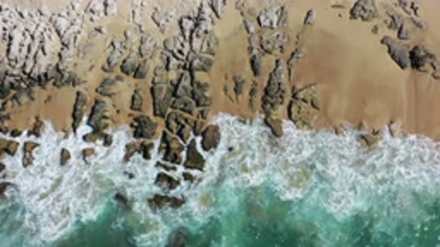 LOS CABOS MEXICO-2020: Sea Waves Rolling Front and Back Creating White Water