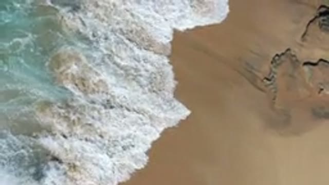 LOS CABOS MEXICO-2020: The Seashore With Cute Waves Reaching The White Sand