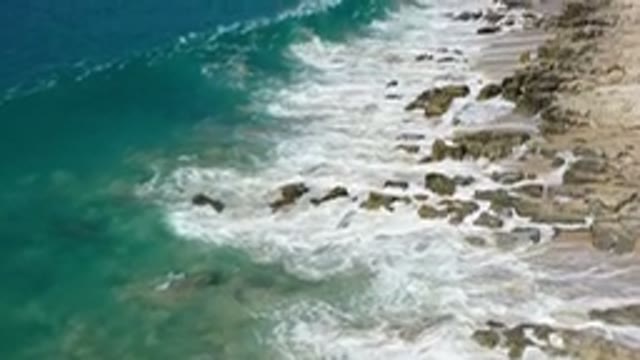 LOS CABOS MEXICO-2020: Green Waves Of Blue Ocean Are Turning White After