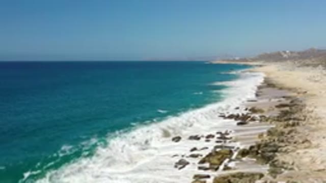 LOS CABOS MEXICO-2020: Beach Sea Water Touching Sand With Waves