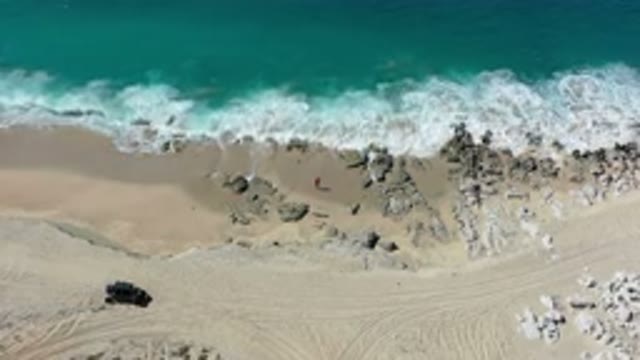 LOS CABOS MEXICO-2020: Aerial View Of A Green And Calm Sea