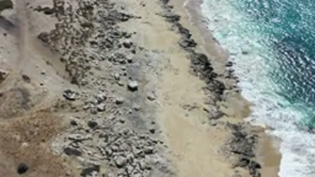 LOS CABOS MEXICO-2020: Aerial View Of A Shoreline With Gentle Waves Approaching