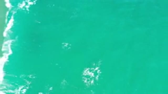 LOS CABOS MEXICO-2020: Teal Blue Beautiful Ocean Water With Rushing Waves From