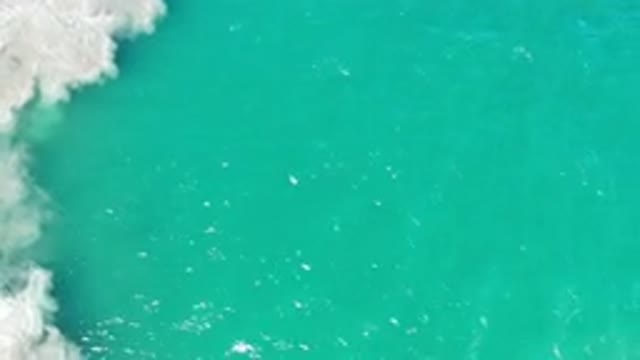 LOS CABOS MEXICO-2020: A Sea View Showing The White And Green Waves Moving