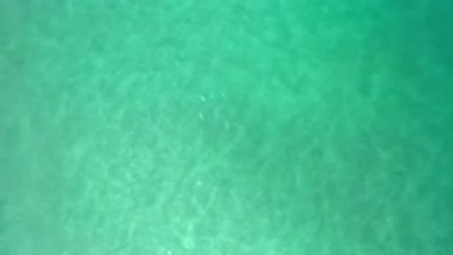 LOS CABOS MEXICO-2020: Greenish Blue Waters Near A Shore During Daylight With