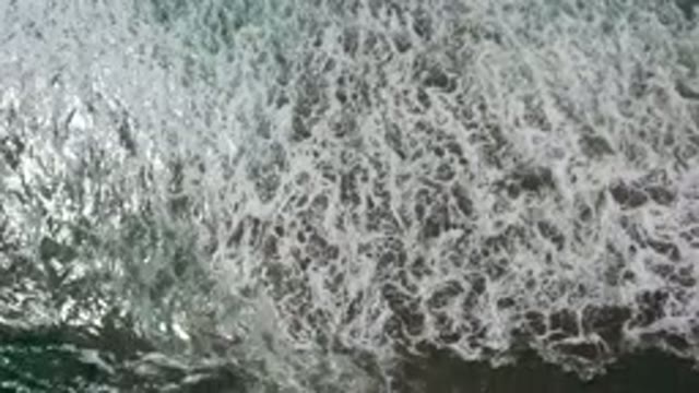 LOS CABOS MEXICO-2020: Overhead View Of Ocean Water With Waves Passing By And