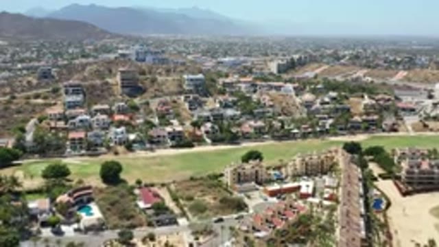 LOS CABOS MEXICO-2020: A Suburban Neighborhood Sits Upon Small Hills On A Sunny Day
