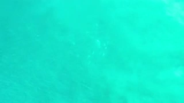 LOS CABOS MEXICO-2020: Very Bright Aquatic Water Gently Flowing With A Hint Of Sunlight