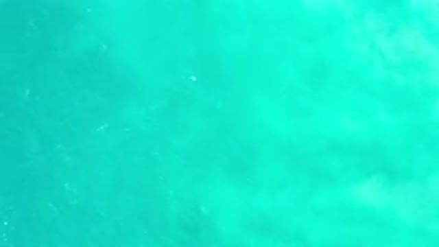 LOS CABOS MEXICO-2020: Beautiful Overhead Shot Of Gentle Waves In A Shimmering
