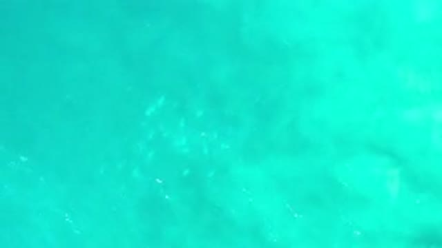 LOS CABOS MEXICO-2020: Green Sea Water Waving in Slow Motion