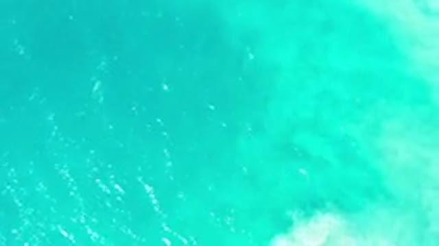 LOS CABOS MEXICO-2020: Camera Zooms In And Out Over Water Making Foam
